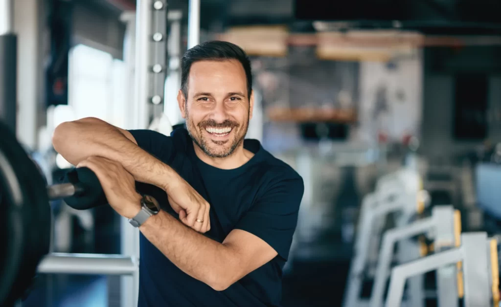 portrait of a smiling man posing for the camera w utc